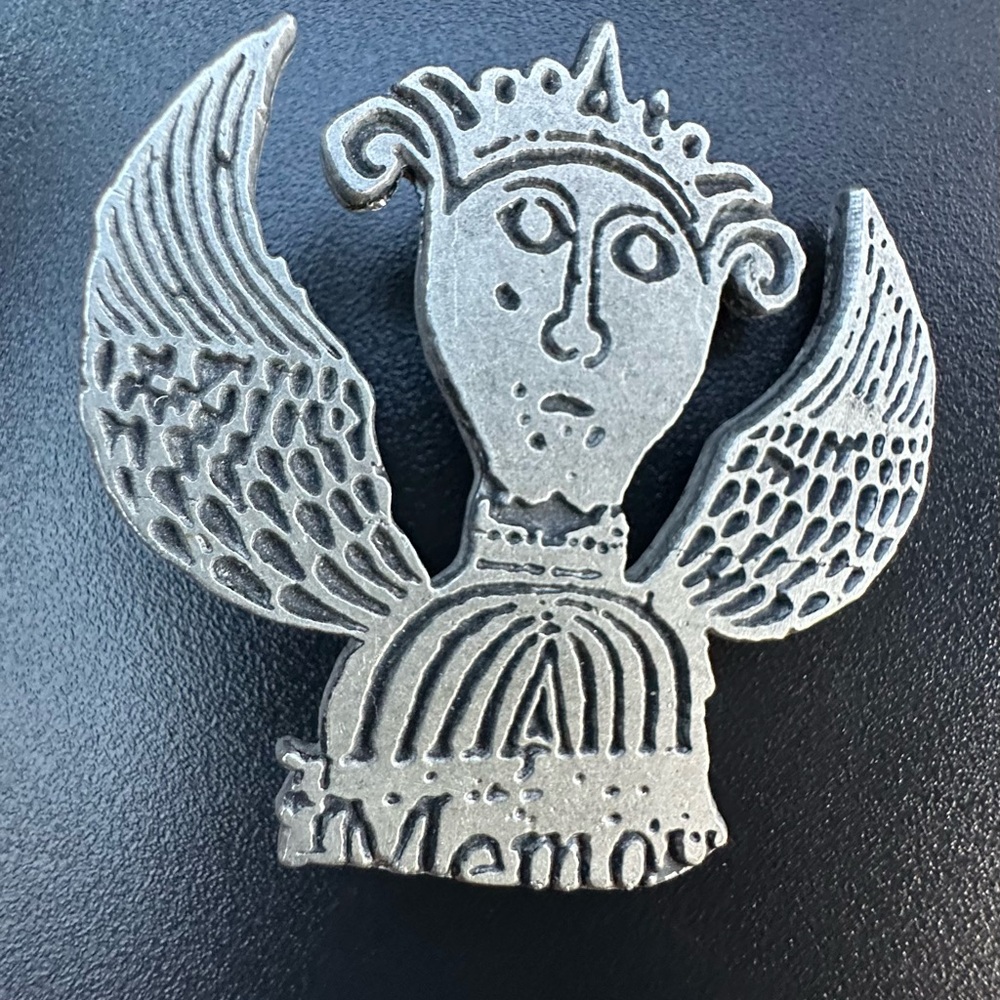 Vintage soul effigy" or "winged cherub" Brooch